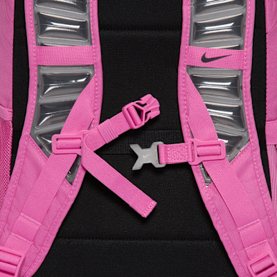 Close-up of Nike Varsity Elite backpack straps in Playful Pink, showcasing adjustable buckles and padded support.